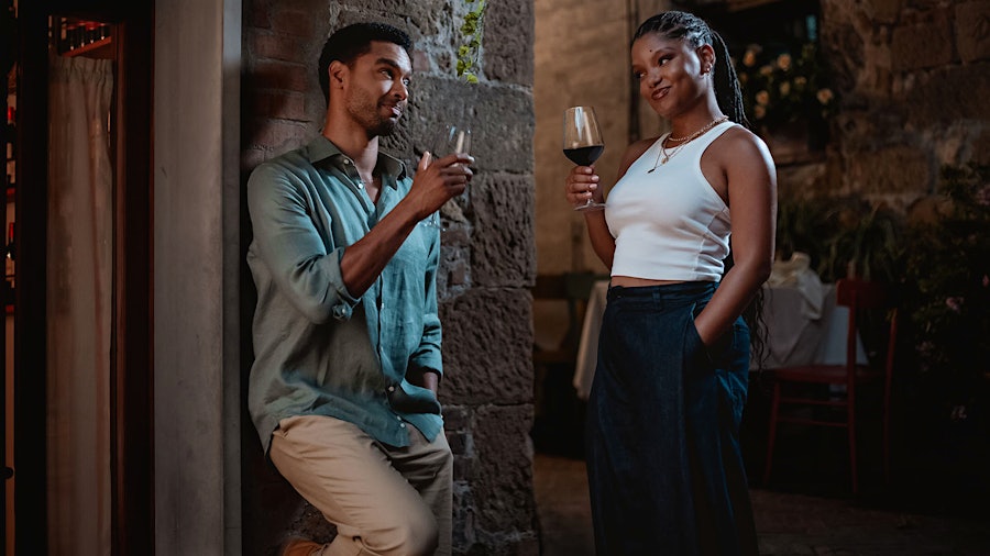 Wine tasting leads to sparks flying for Halle Bailey and Regé-Jean Page in <i>You, Me & Tuscany</i>.